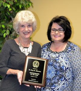 WCC Educational Office Professionals President Theresa White-Wallace (right) congratulates WCC President Dr. Kay Albertson on her selection as the District 12 Association of Educational Office Professionals’ Administrator of the Year.