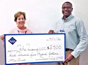 : Foundation of Wayne Community College Executive Director Adrienne Northington accepts a $2,500 donation for mini grants from Lindsey Grimes, club manager at the Goldsboro Sam’s Club.