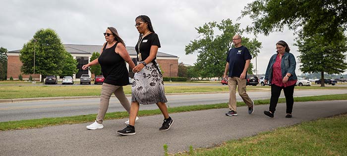 Employees walking.